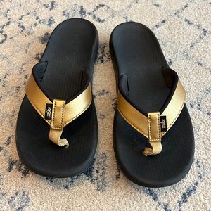 Nike Black and Gold Sandals Size 7, EUC